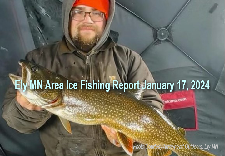 image of ice fisherman holding nice lake trout caught in the Ely Minnesota region