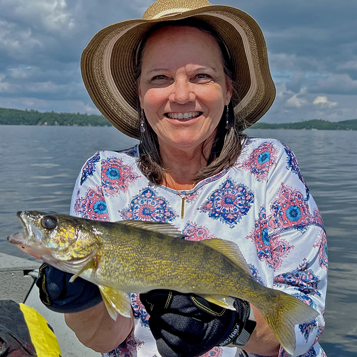 The Hippie Chick showing off a nice Lake Vermilion Walleye