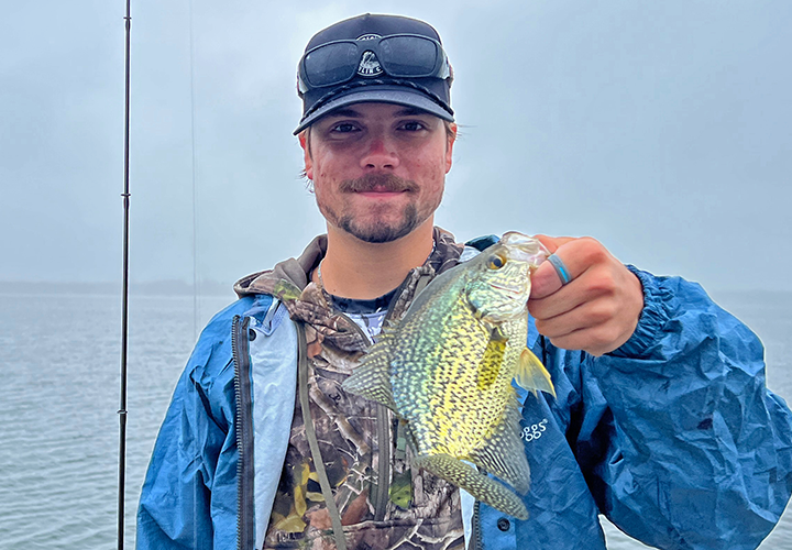 image of Cade Fitzgerald with nice crappie caught on a fishing charter with Jeff Sundin 