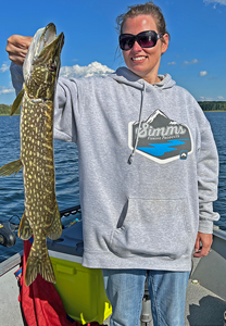 image of Robin with nice northern pike caught on a fishing charter with Jeff Sundin 
