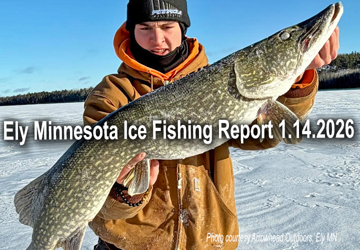 image of ice fisherman holding huge northern pike caught near Ely Minnesota