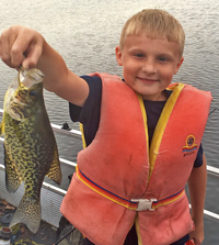 image of Gavin holding nice crappie