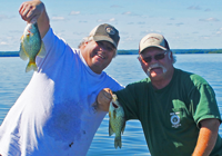 image of mike and todd clark with lake of the woods crappies