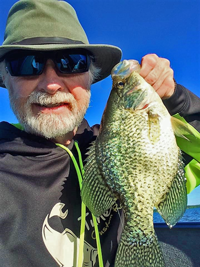 image of greg clusiau with big bowstring lake crappie