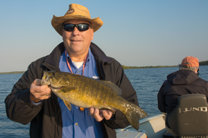 image of paul kautza with smallmouth bass