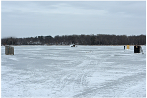 image of spearing shelters on the ice