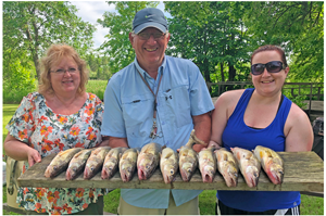 image of the danielson family with walleye limits