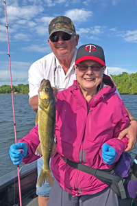 image of the danielson family with walleye limits