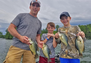 image of family with big crappies