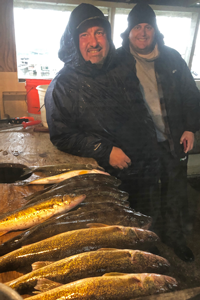 image of scott and mike with limits of walleye