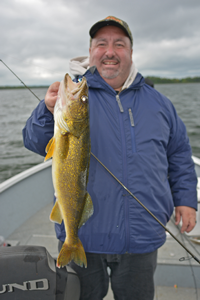 image of scott johnson with big walleye