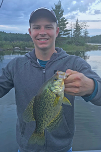image of angler with big crappie