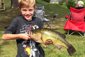 image of Will with big Largemouth Bass