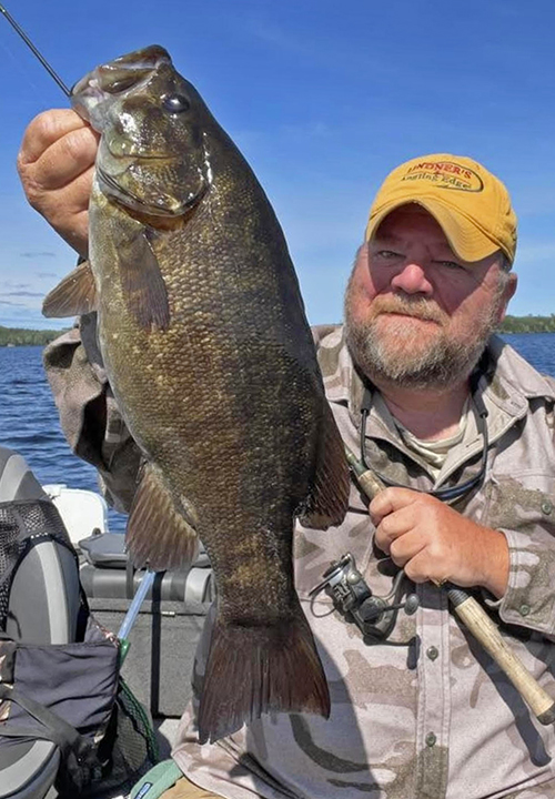 image of smallmouth bass caught by an angler in the Ely MN area