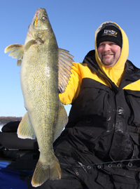 image of Jon Thelen holding large Walleye