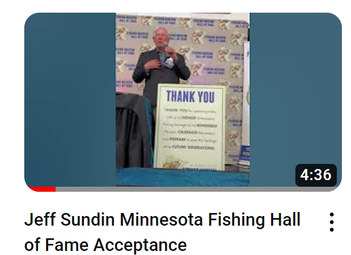 image of Jeff Sundin being awarded with plaque at the Minnesota Fishing  Hall of Fame induction 