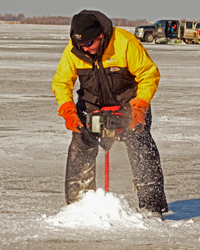 image of Eskimo Shark Ice Auger drilling hole