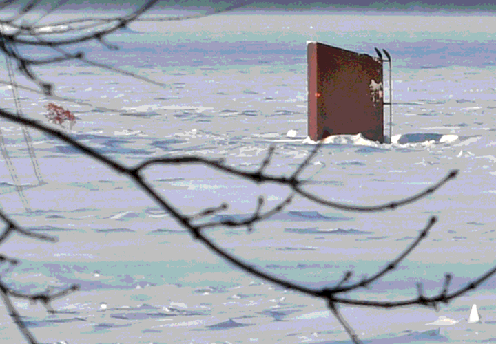 image of old homemade ice fishing shelter