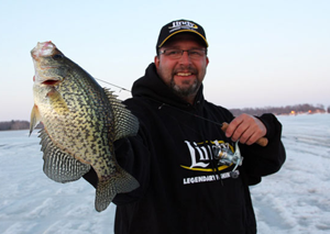 image of Paul Fournier with Crappie on ice
