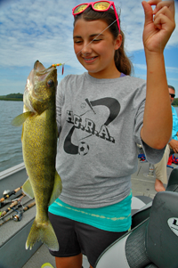 image of young girl with big Walleye caught on Lindy Spinner