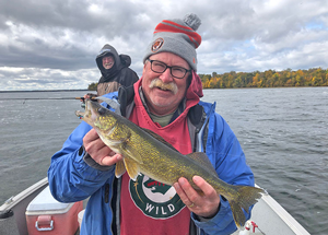 image of mike cooley with winnie walleye