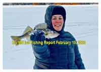 image of woman holding walleye caught near Ely MN