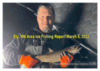 image of ice fisherman holding lake trout