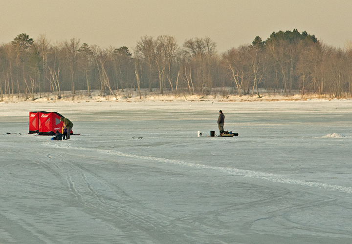 image of ice fisherman on the ice near Grand Rapids Minnesota