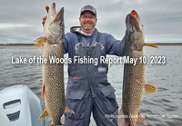 image of angler holding 2 giant pike caught at Zippel Bay