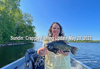 image of the Hippie Chick with huge crappie 