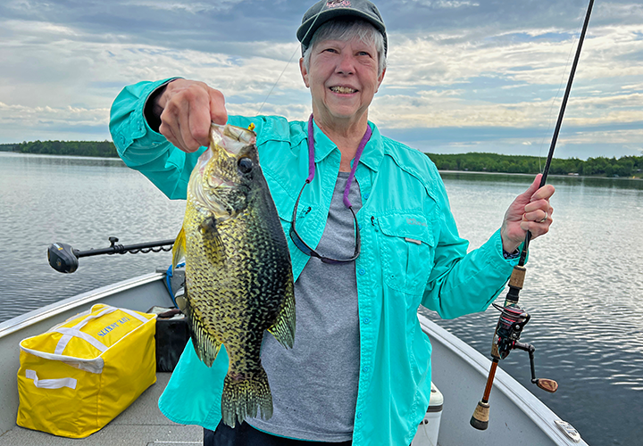 image of penny becker with huge crappie caught in the Leech Lake area