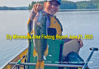 image of woman holding nice smallmouth bass