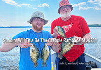 image of Kollin and Kurt Volkert holding nice crappies they caught near Deer River Minnesota