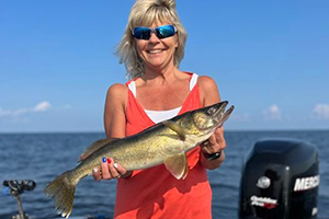 woman holding a nice walleye from Lake of the Woods