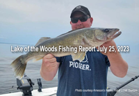 image of angler holding big walleye on lake of the woods
