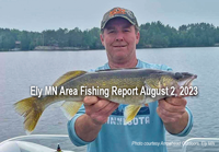 image of angler holding nice walleye