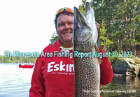 image of fisherman holding giant norther pike
