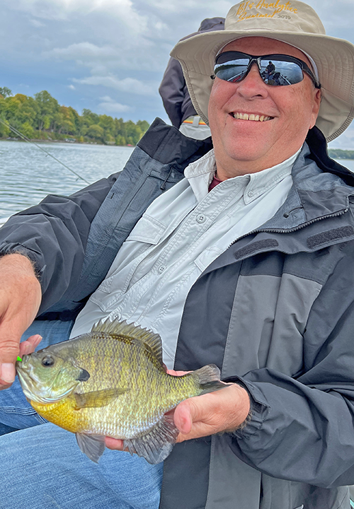 image of Paul Kautza with big bluegill caught near Deer River Minnesota