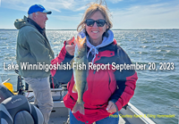 image of Karen Hommedahl holding a nice Winnie Walleye