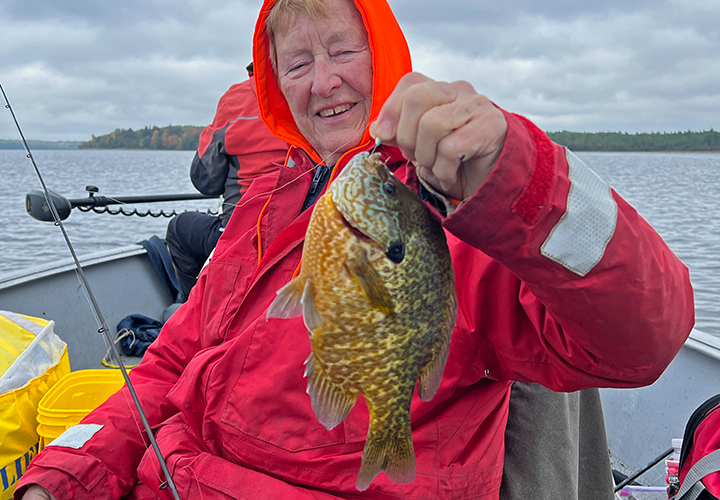 image of Karen Reynolds with big sunfish 