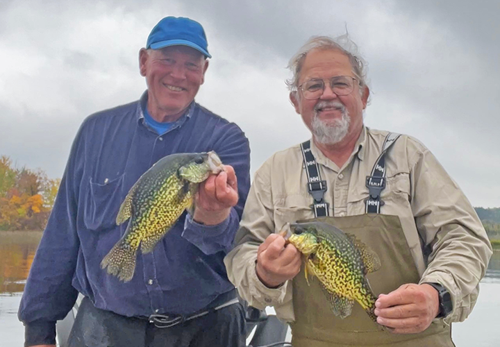 image of Jeff Sundin and Ken Seufert holding big crappies