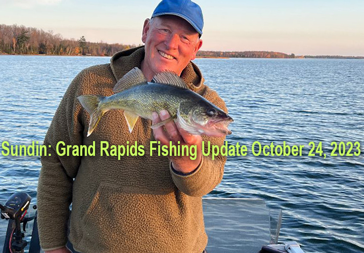 image of walleye fishing guide jeff sundin holding nice walleye