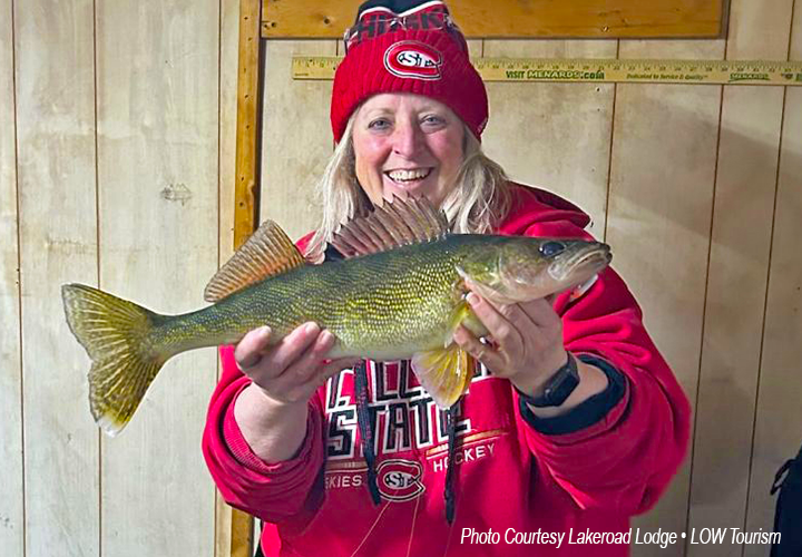 image of ice angler with nice walleye caught on lake of the woods