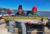 image of anglers holding huge sturgeon they caught on the Rainy River