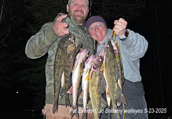 image of Patrick Everson and Joelle Bellamy showing off a stringer of walleyes