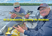 image of Tim Fischbach and Larry Lashley with a walleye double catch