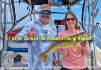 image of Tim "Wingnut" Hill with charter fishing customer who caught a nice walleye on lake of the woods