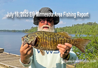 image of fisherman holding large smallmouth bass caught near Ely Minnesota