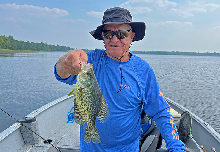Gary Patterson with a big crappie caught on fishing charter with Jeff Sundin 
