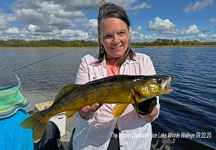 The Hippie Chick holding nice walleye from Lake Winnie